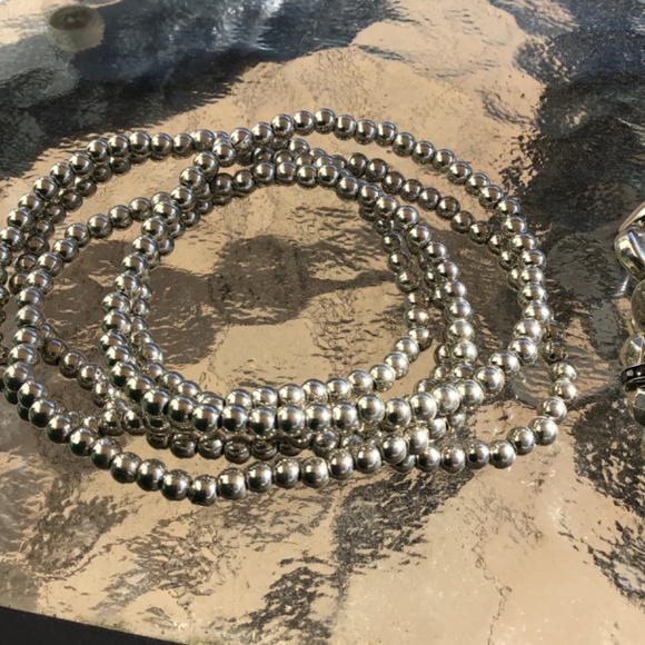 7 Stackable Silver Colored Stretch Bracelets - Picture 3 of 4